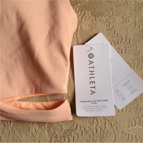 • New • Athleta Conscious Cut Out Crop A-DD/ Bright Peach Multi winner Host Pick - Picture 6 of 15